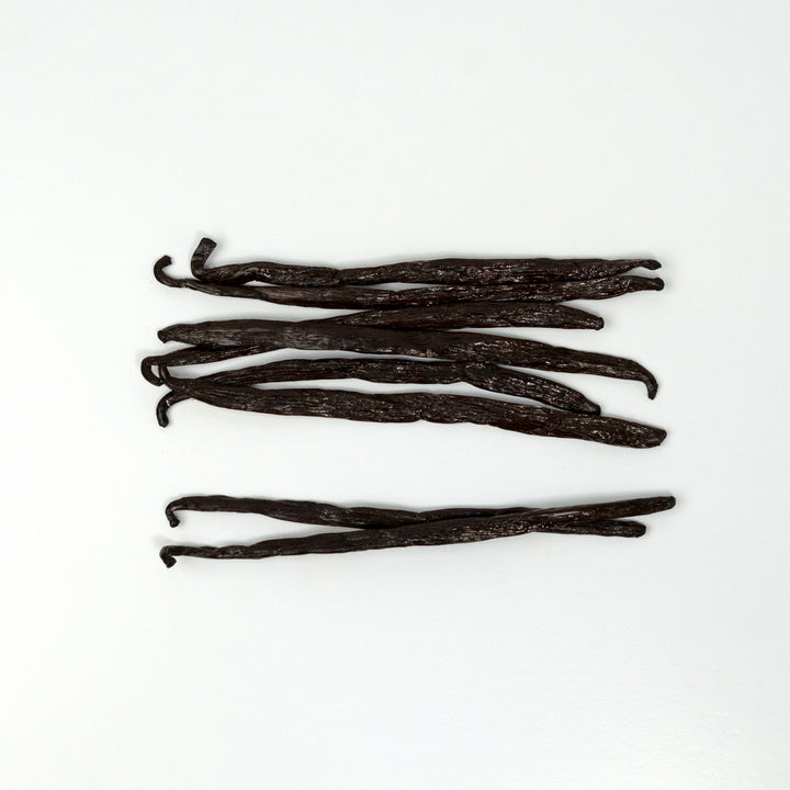 small bundle of congo vanilla beans spread out